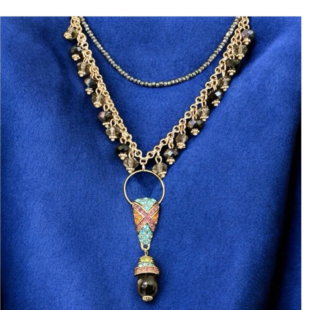 Heidi Daus art deco crystal pendant on a black & gold iridescent necklace